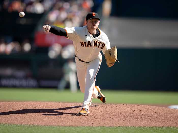 Oct 3, 2021; San Francisco, California, USA; San Francisco Giants starting pitcher Logan Webb (62) delivers a pitch against the San Diego Padres during the first inning at Oracle Park.